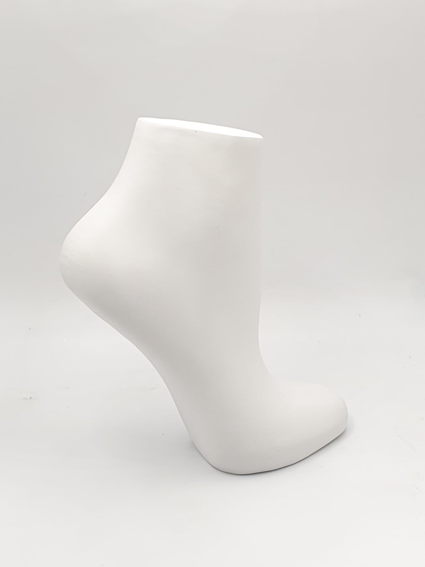 Exhibidor tobillera pie