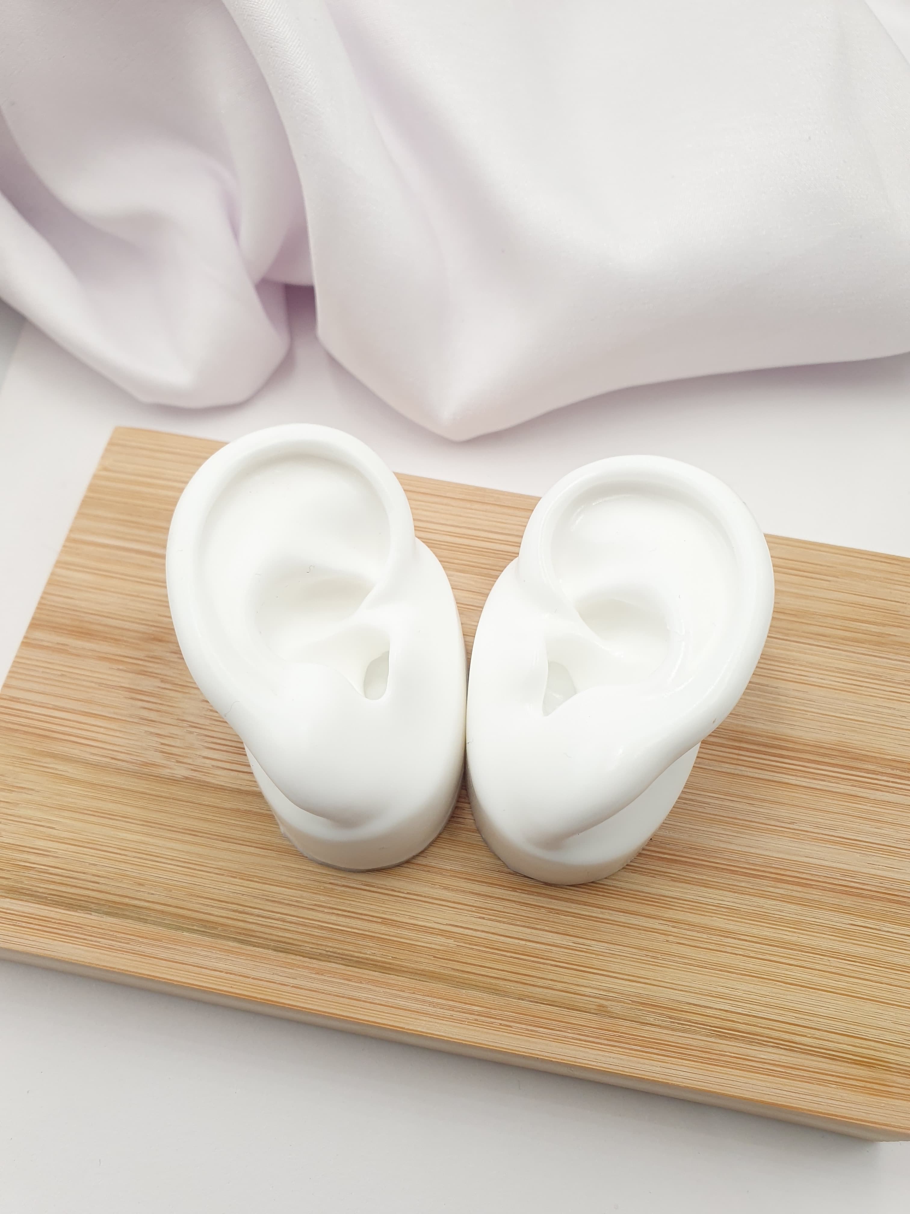 Exhibidor orejas de silicona Par